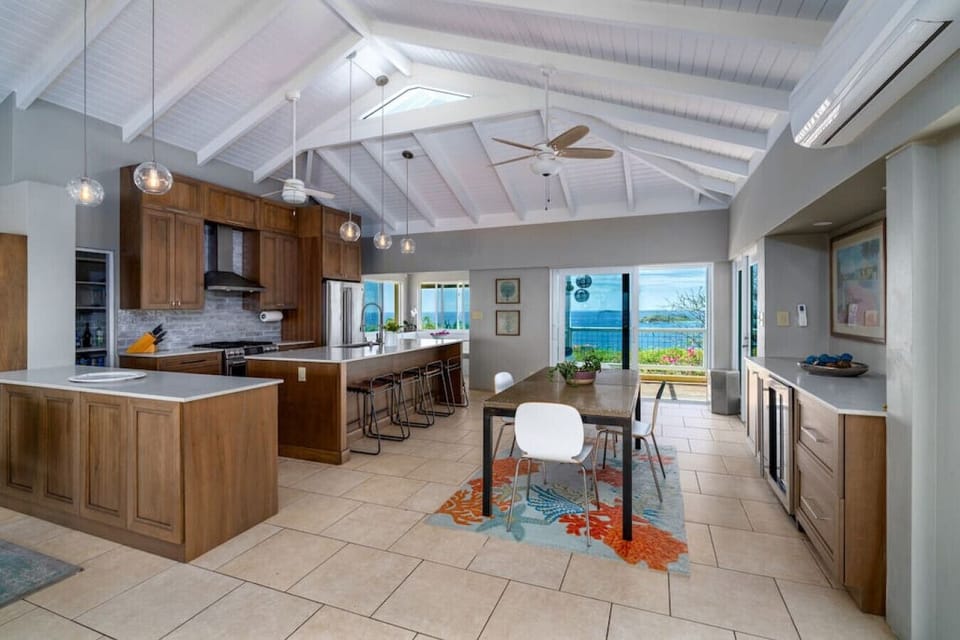 The spacious kitchen and dining area with full AC