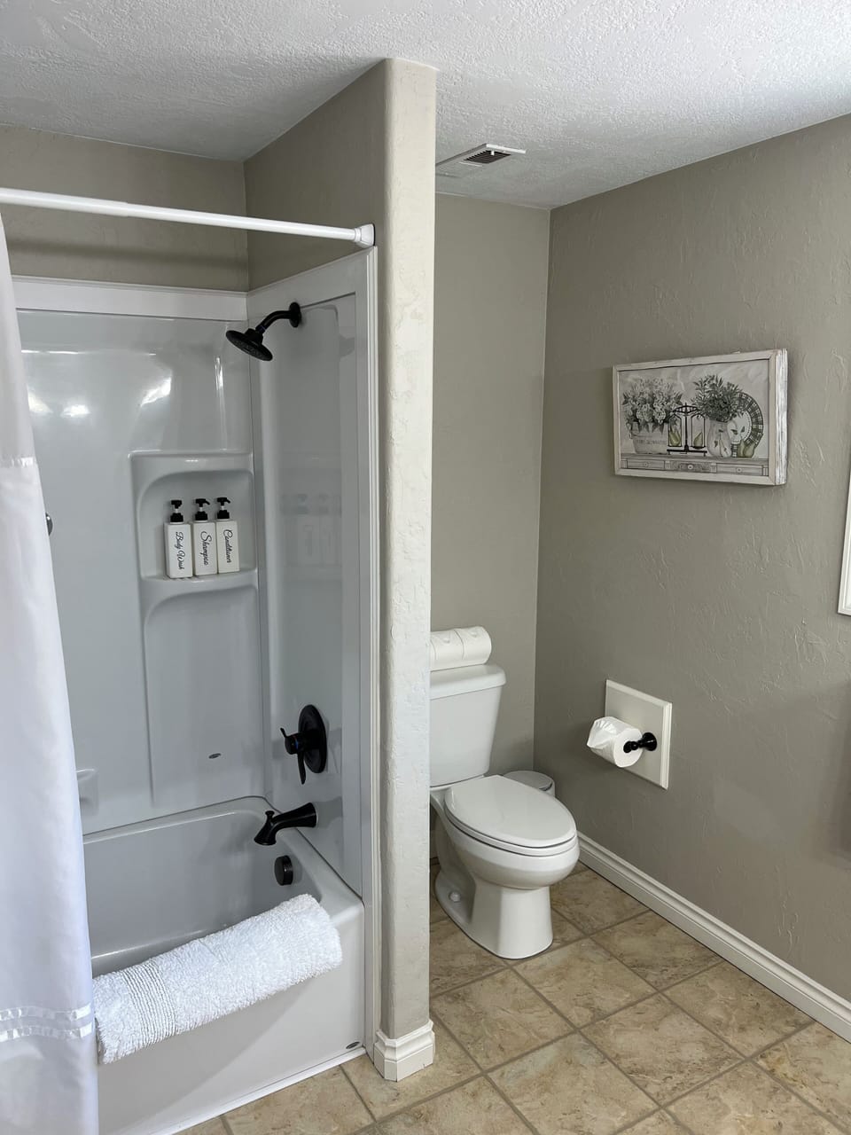Step in tub/shower combo. 