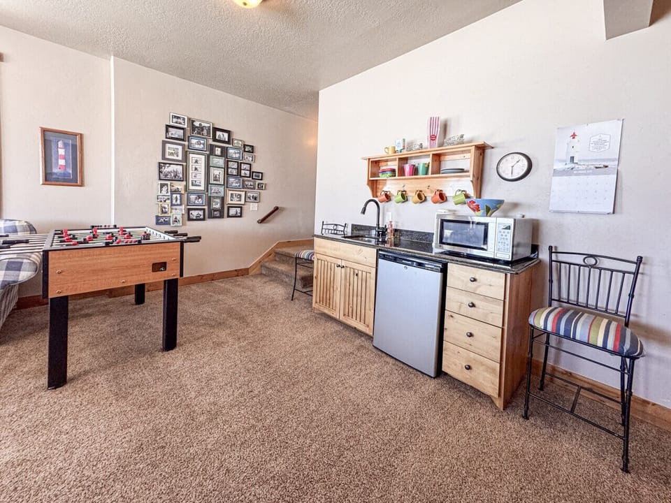 Basement living room, foosball table