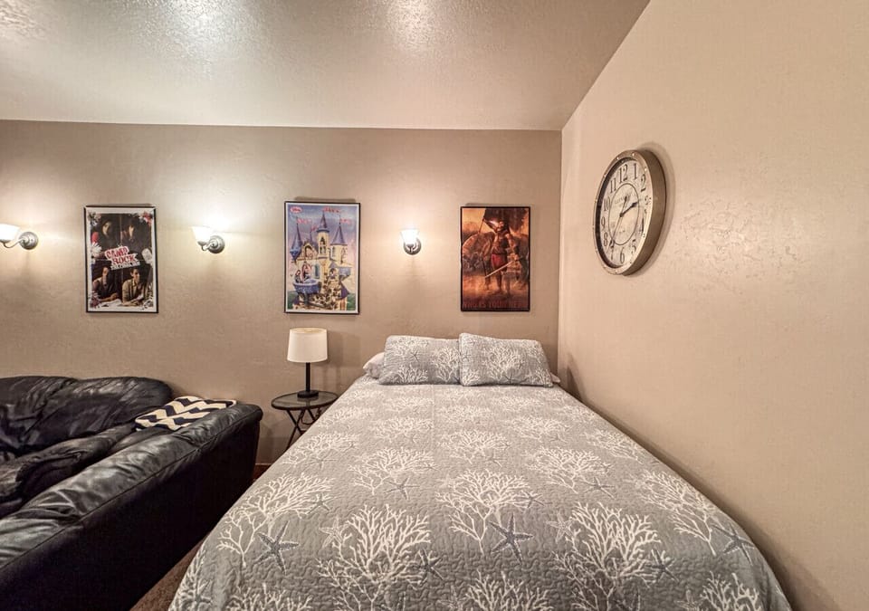 Movie room with queen bed