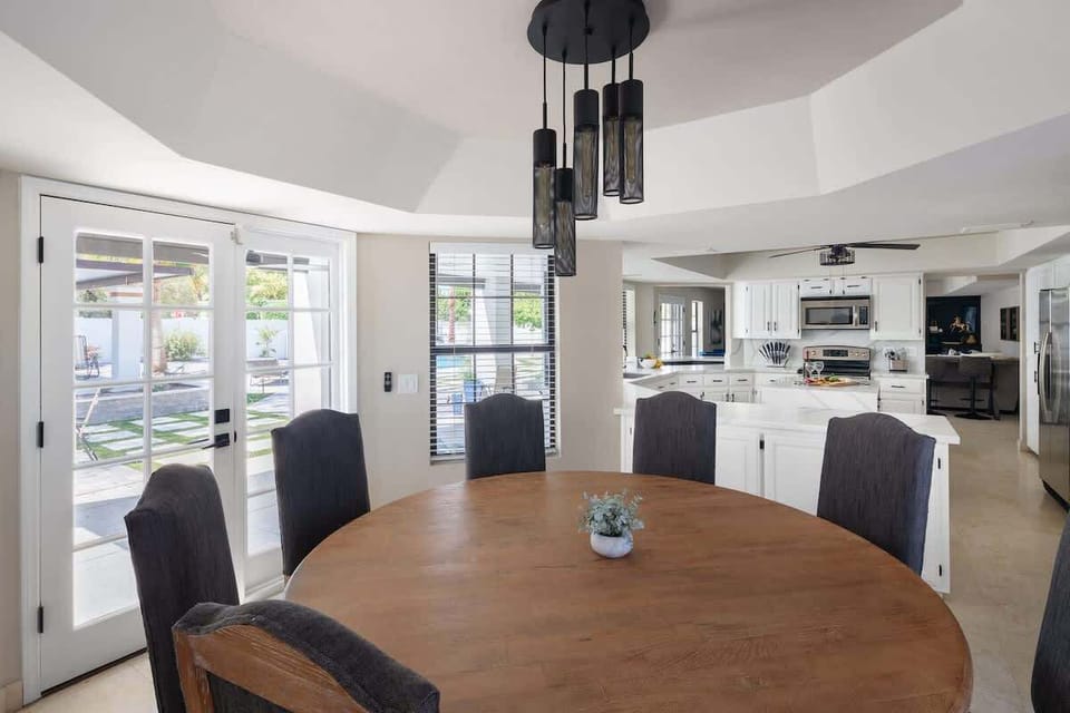 Gather around in the elegant formal dining area, designed to seat eight guests comfortably.