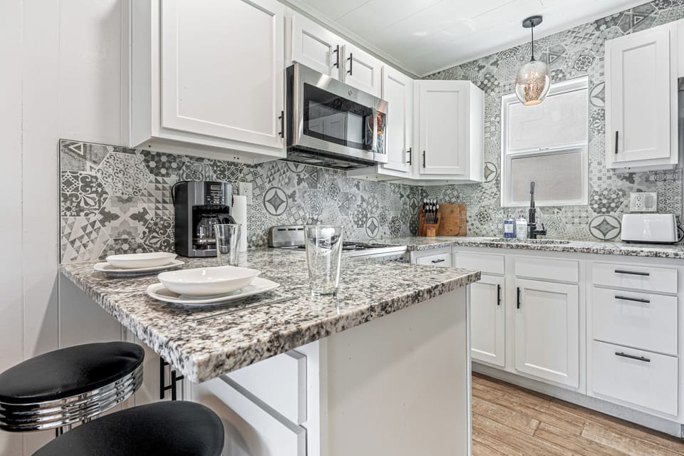 Fully equipped eat-in kitchen. Stocked with everything you need.