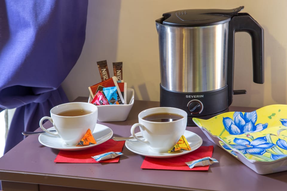 Coffee/tea maker, fridge, shared microwave, electric kettle