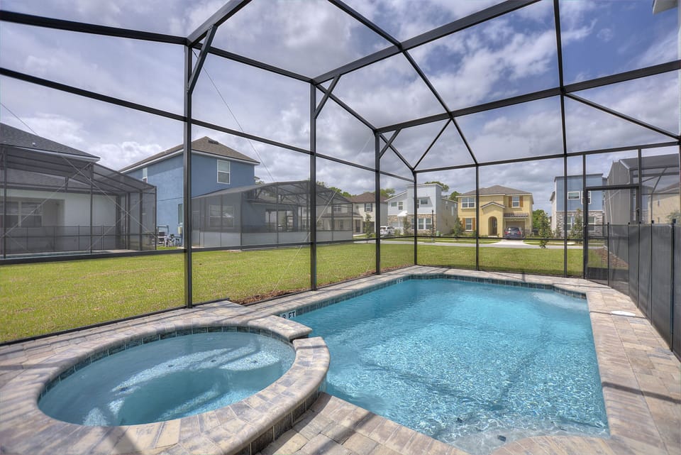 Private swimming pool with spa