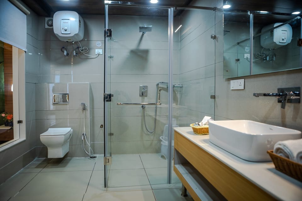 Shower, free toiletries, slippers, towels