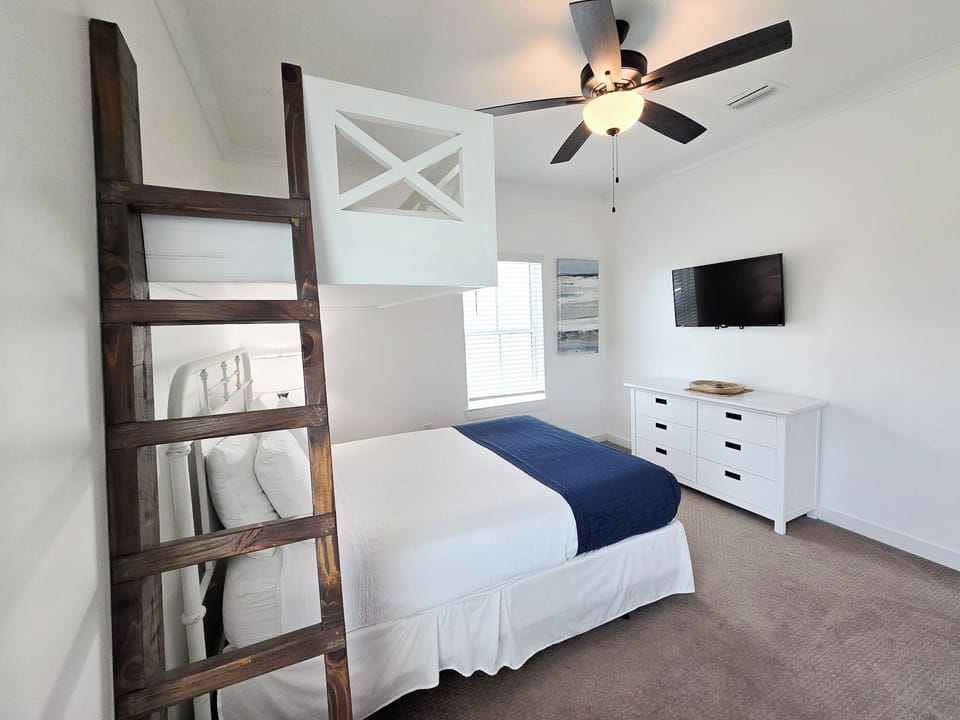 Enjoy ample closet and storage space along with the warmth of natural light in this unique cozy retreat furnished with a Smart TV for your viewing pleasure.