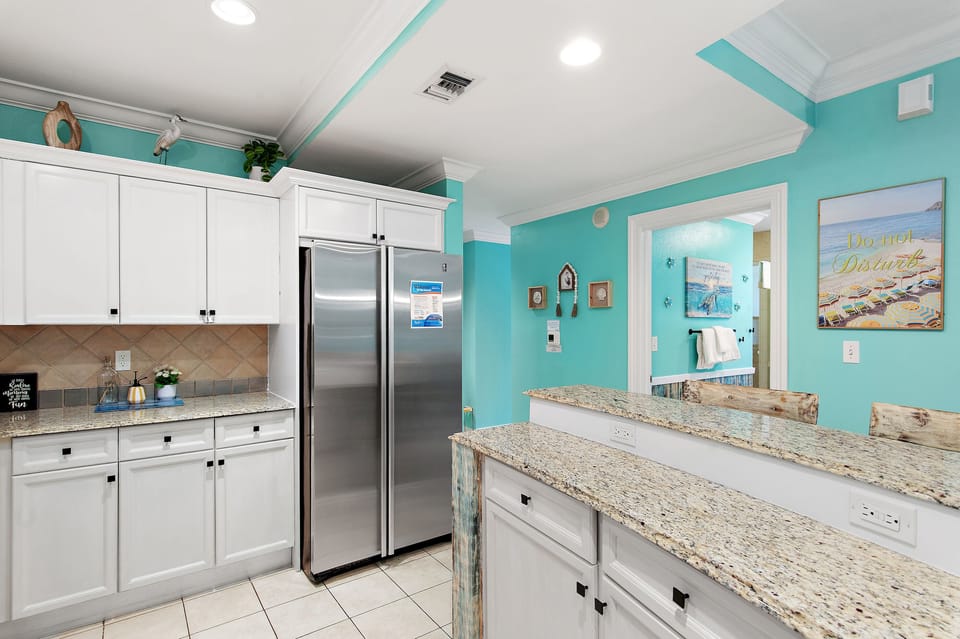 Open kitchen design keeps everyone connected while cooking and gathering.