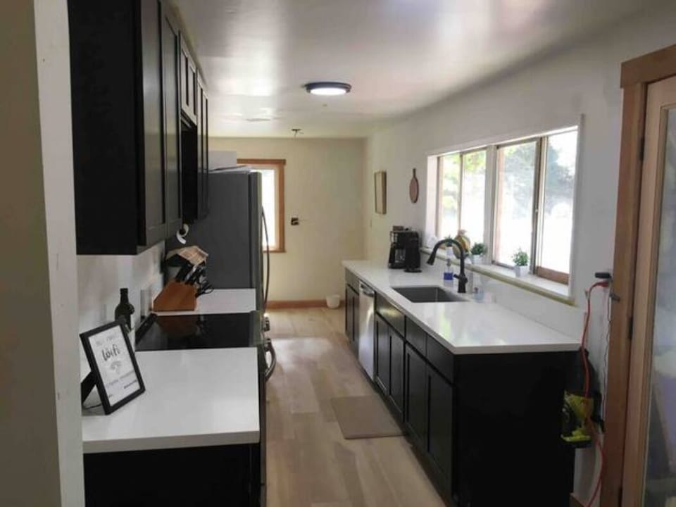 Renovated, clean, 4 appliance, lots of cookware , stocked with supplies/snacks. 