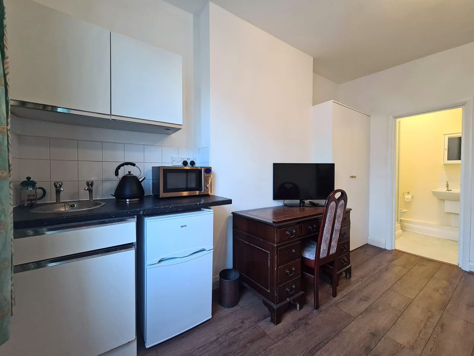 Mini-fridge, microwave, electric kettle, freezer