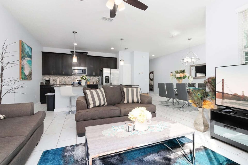 The living room and kitchen have plenty of space for a large group