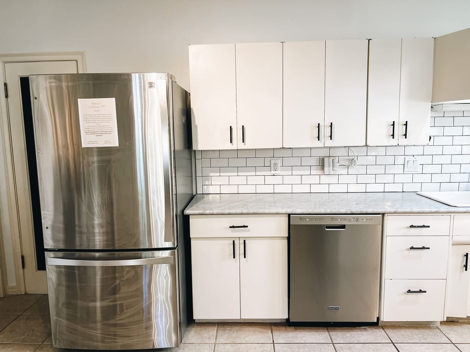Kitchen equipped with stainless steel appliances and all utensils needed