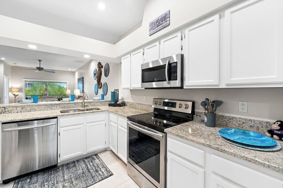 Kitchen with sleek, modern appliances #KitchenGoals