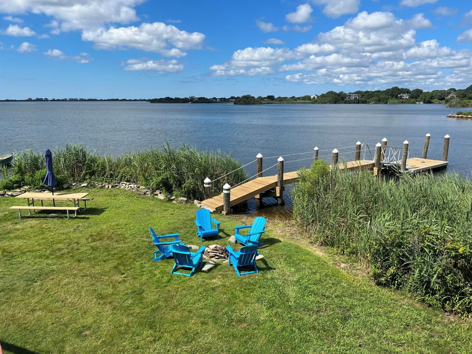 View of property, pond, and new dock.