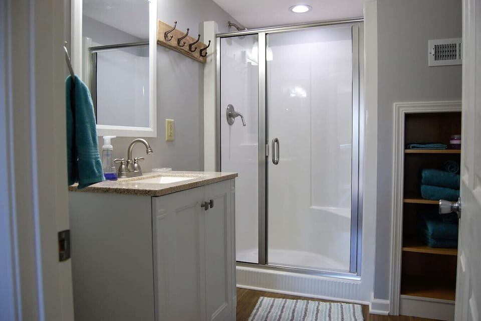 Upstairs full bathroom with stand-up shower.