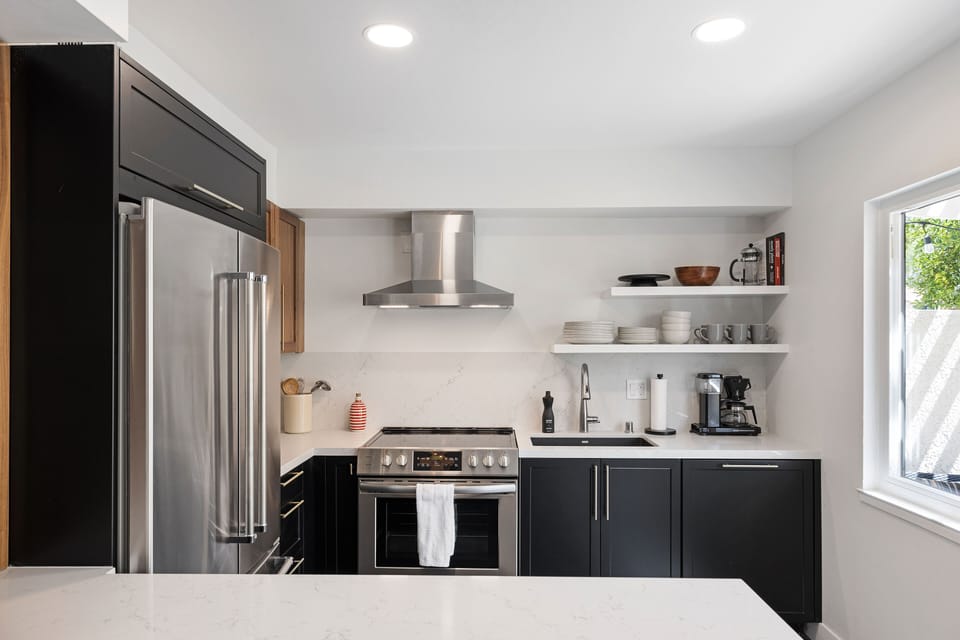 Brand new chef kitchen with walnut cabinets, premium stainless steel appliances