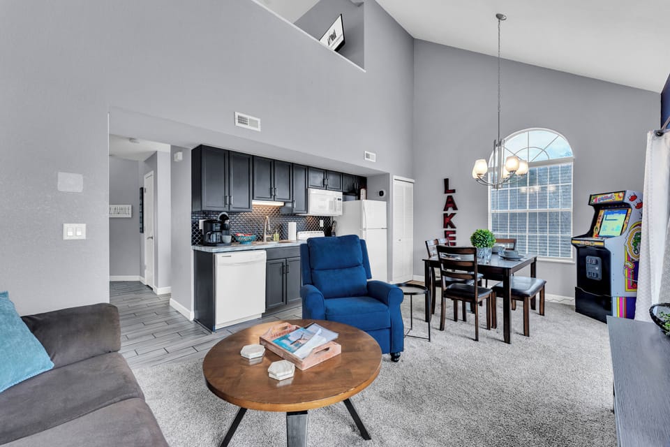 Open concept with plenty of room and seating for your group. Recliner and sofa. 