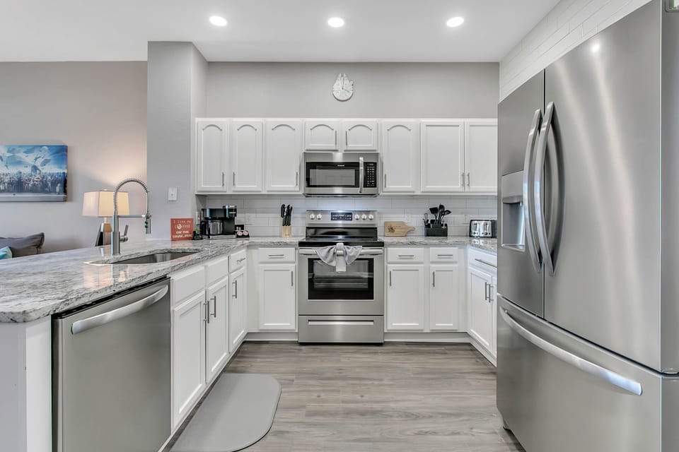 Cook with a view: prepare meals while watching kids swim in the pool