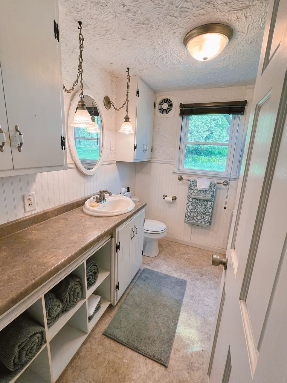 Second bathroom with shower + washer and dryer
