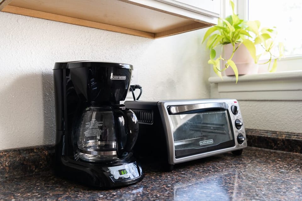 Side A: Including the ever so important coffee maker.
