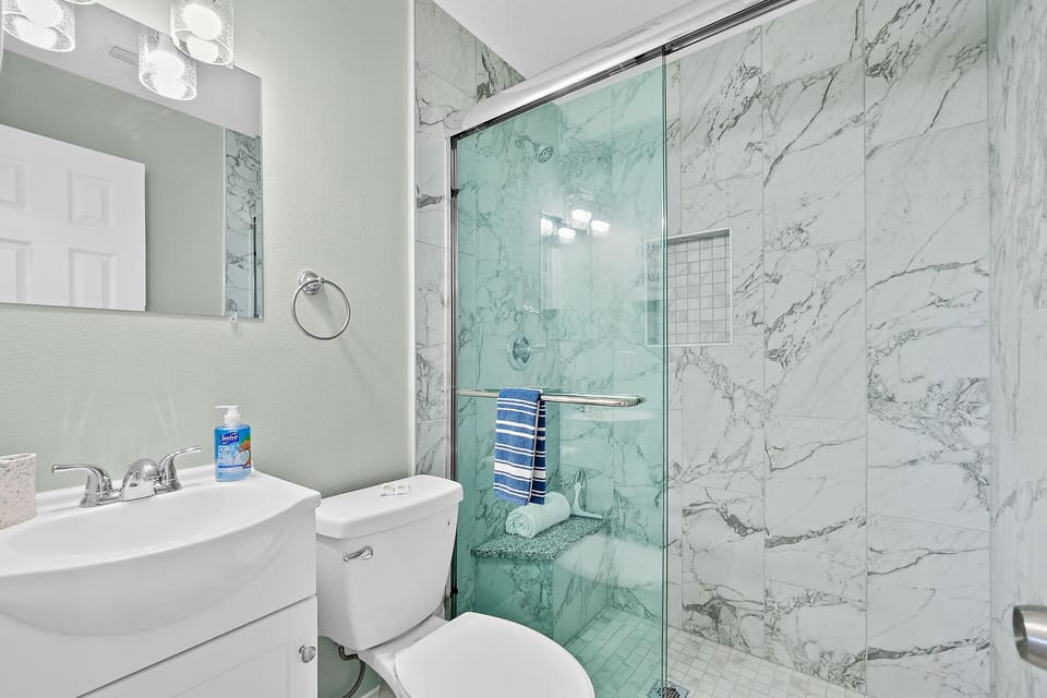 Guest Bathroom with Walk In Shower.