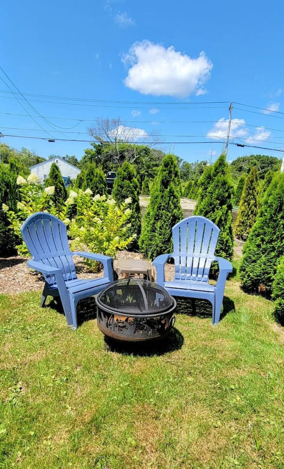 Adirondacks and fire pit for Unit B, in private garden.