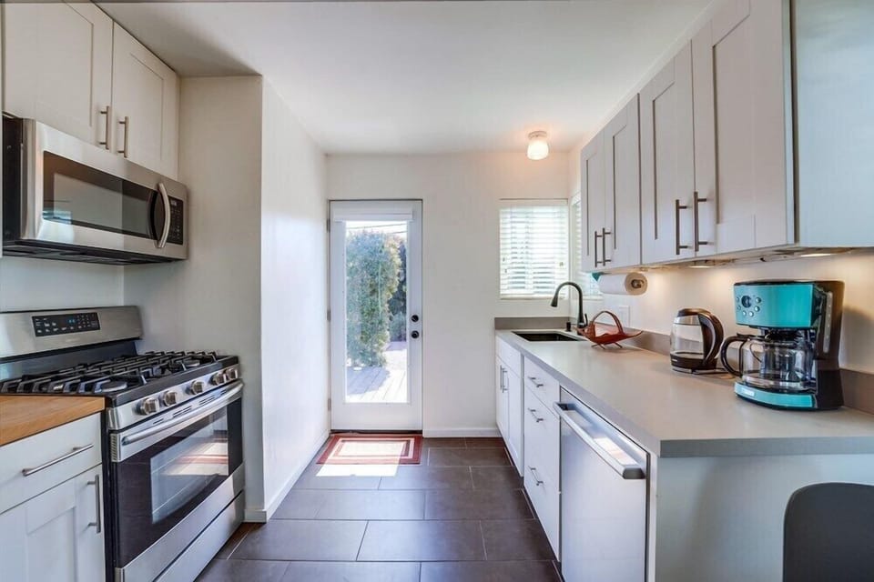 The kitchen looking towards the back door.