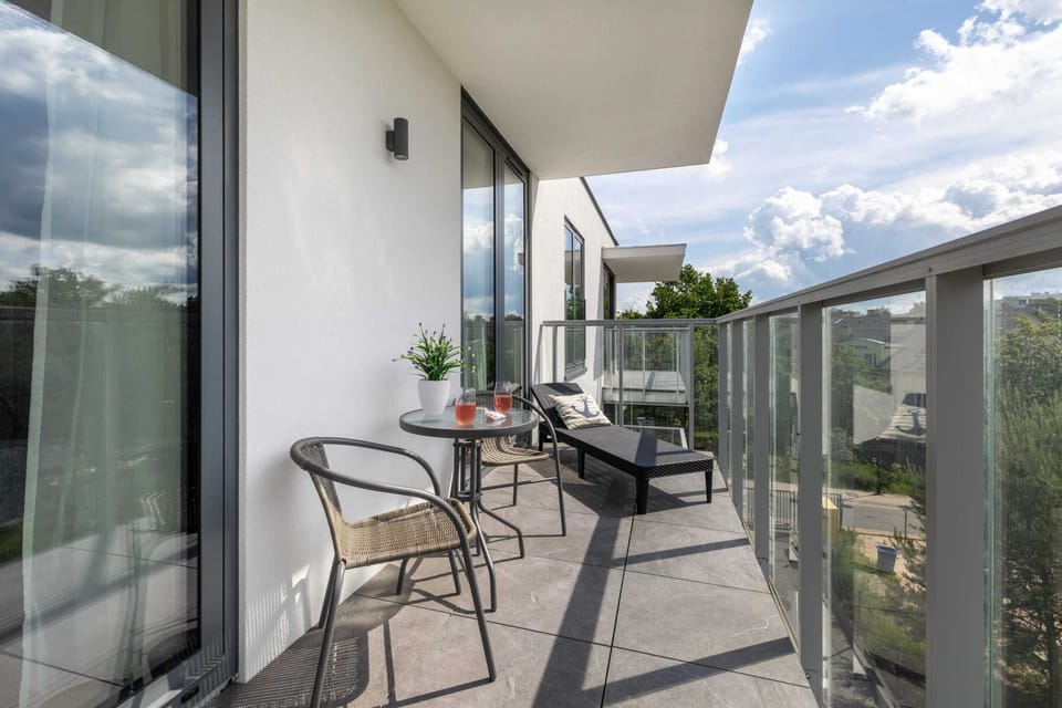 The balcony's peaceful ambiance is ideal for unwinding. 