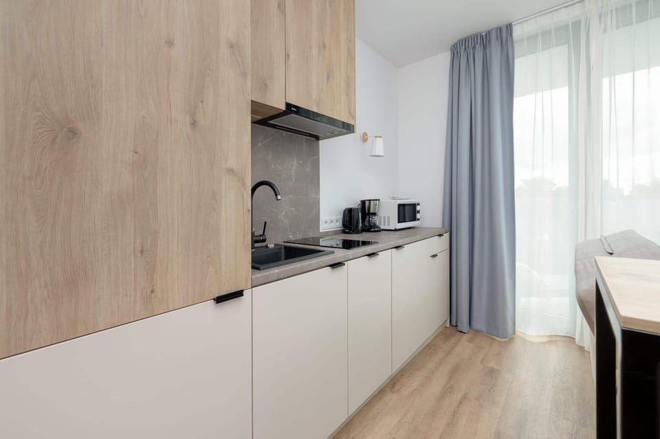 The elegant kitchenette perfect for preparing delicious meals.