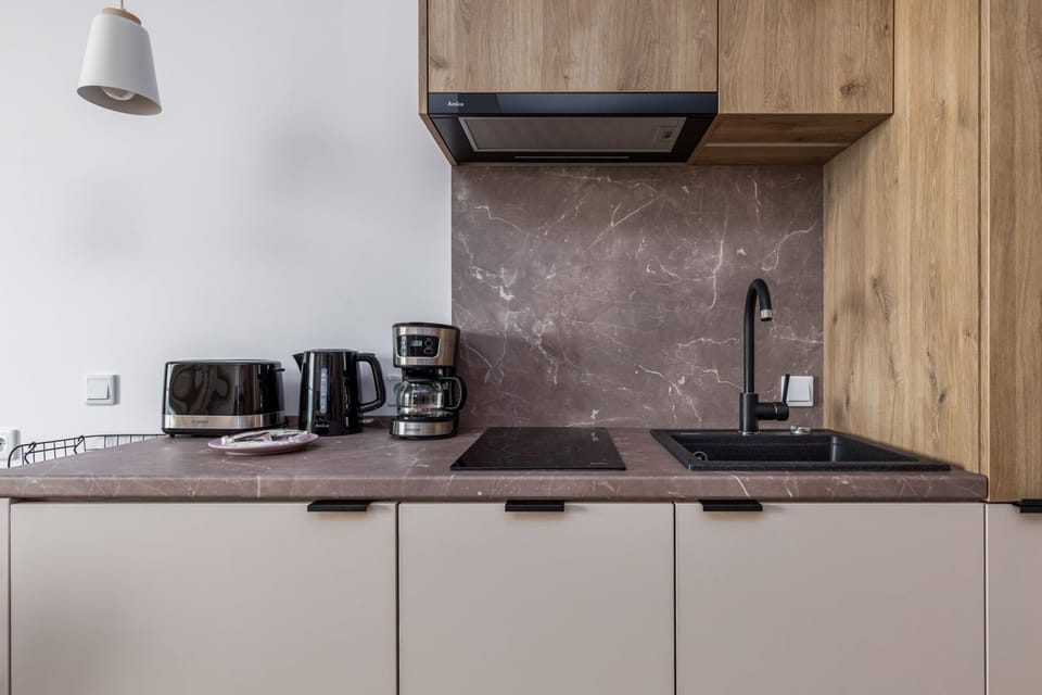 The kitchenette's practical layout maximizes space and functionality.