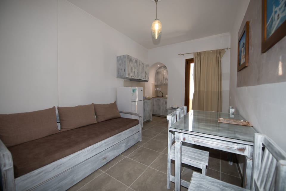 Superior Apartment, Balcony | Living area | Flat-screen TV