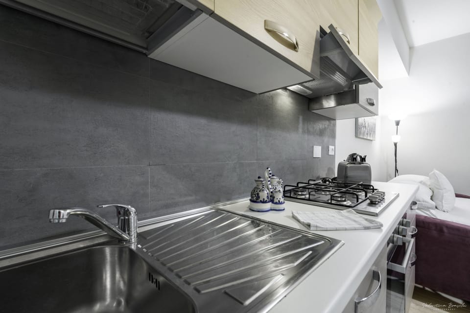 City Apartment, 1 Bedroom | Living area | 80-inch flat-screen TV with digital channels, TV