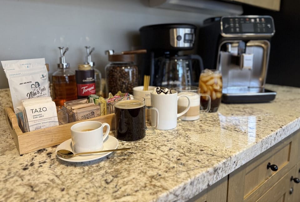 Custom coffee/hot chocolate bar. LatteGo machien brews everything from black coffee and espresso to lattes and iced coffee. Drip coffee maker. Local Vail Mountain fresh coffee beans and fixings provided!