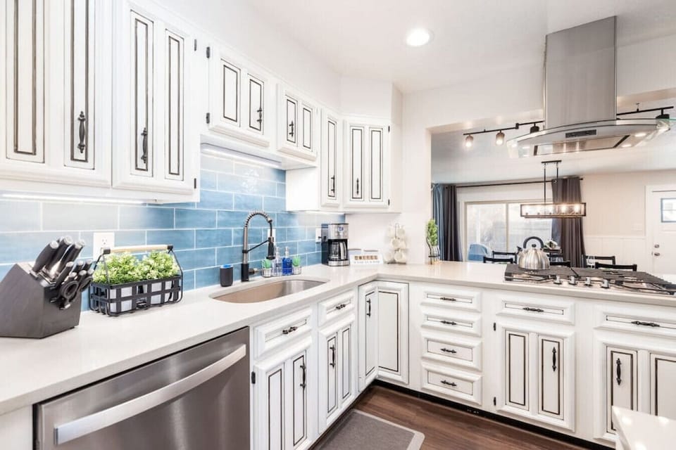 Clean Kitchen area with plenty of cabinets