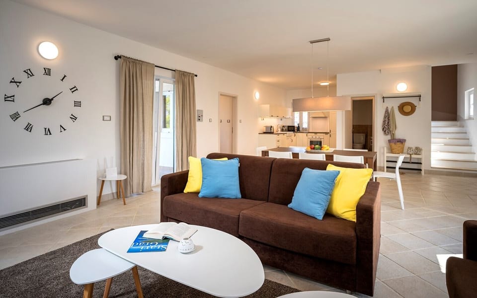 Living room, dining room, kitchen.