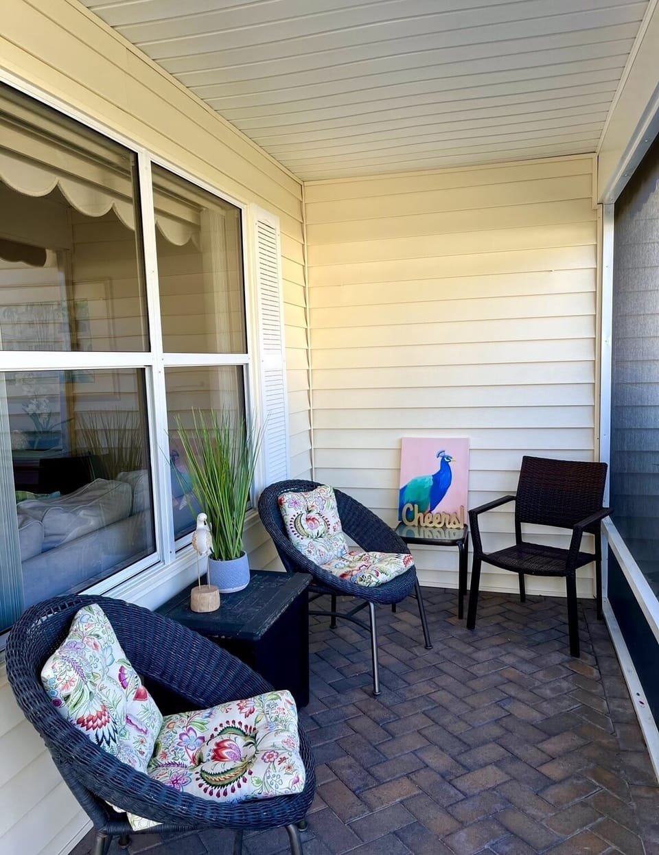 screened porch in front of house