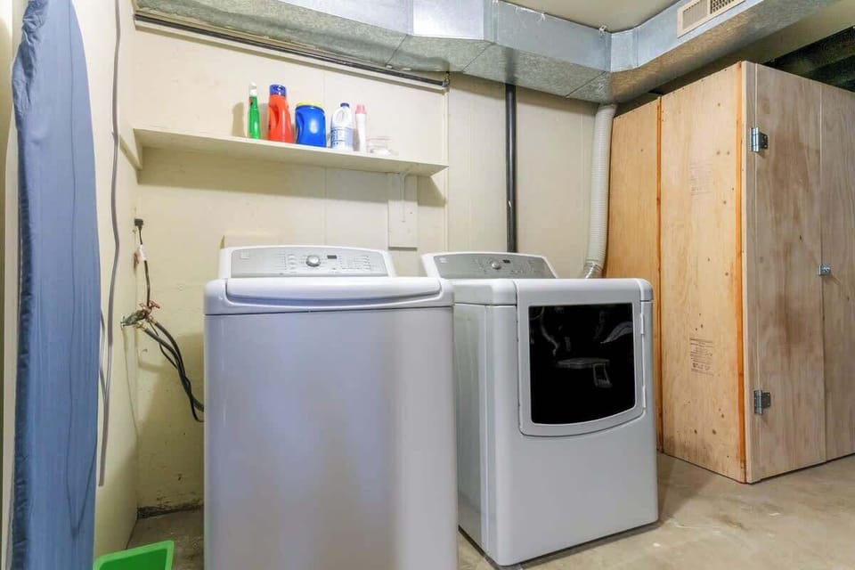 Laundry room with washer and dryer 