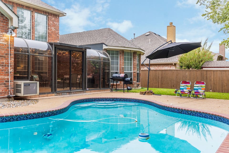 Unwind after a long day by relaxing in the pool in the backyard! 