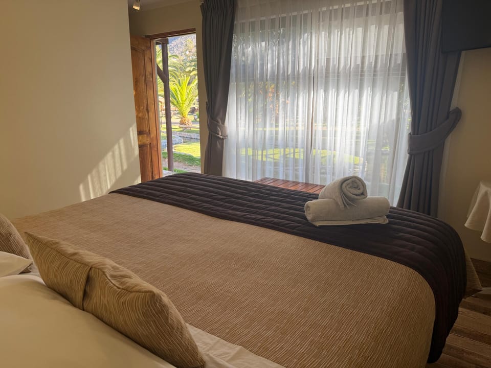 Standard Room, Lagoon View | Down comforters, in-room safe, individually furnished, cribs/infant beds
