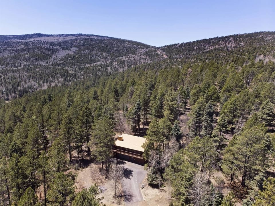 Exterior view from above where miles of trails can be traversed from the property by stepping out side