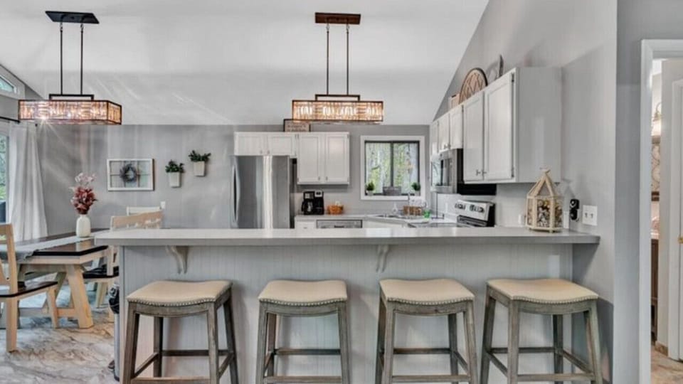 Enjoy casual dining that overlooks the kitchen.