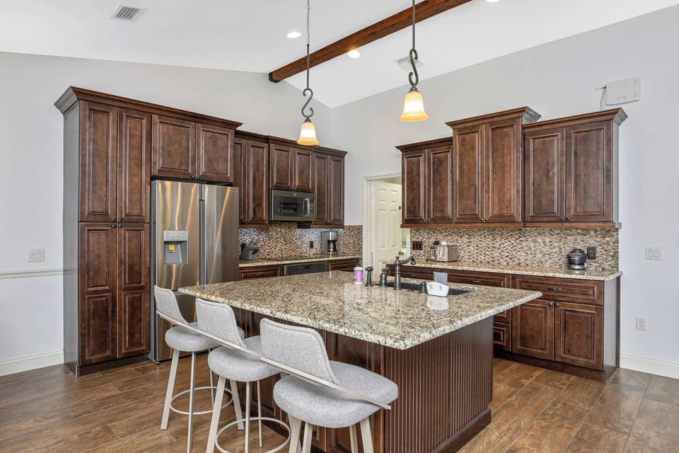 Fully stocked and updated kitchen with a large island