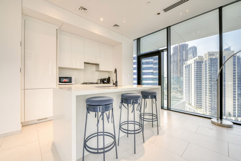 Exclusive Apartment, 2 Bedrooms | Private kitchen | Electric kettle, highchair, dining tables