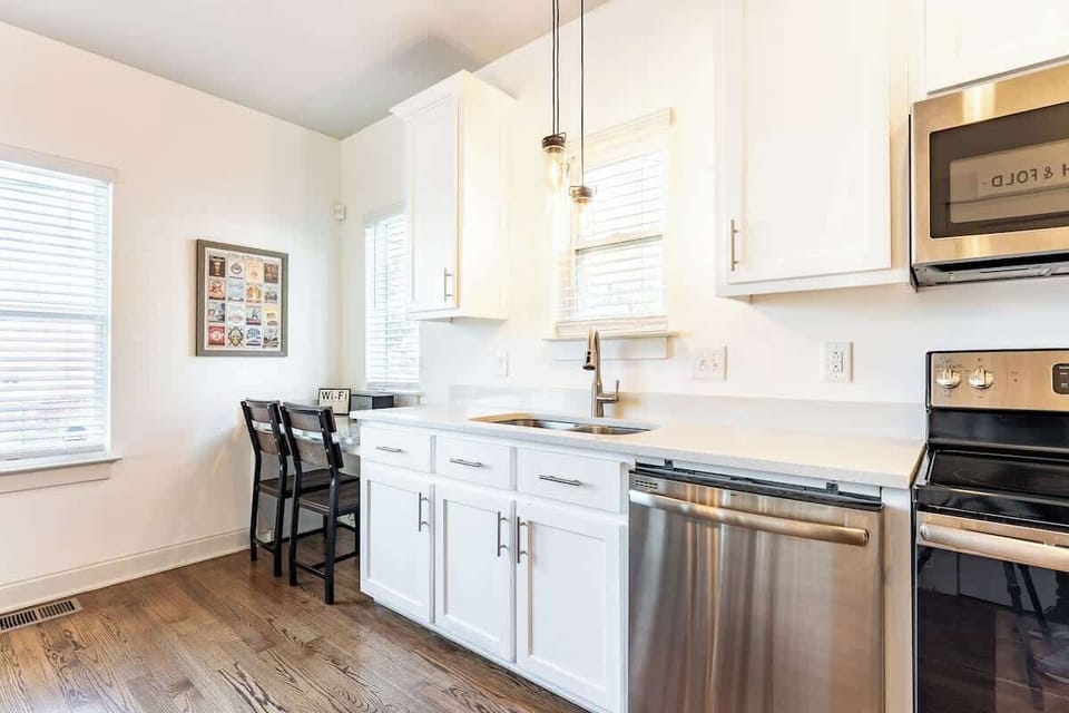  Bright, modern space with stainless steel appliances and inviting dining nook!