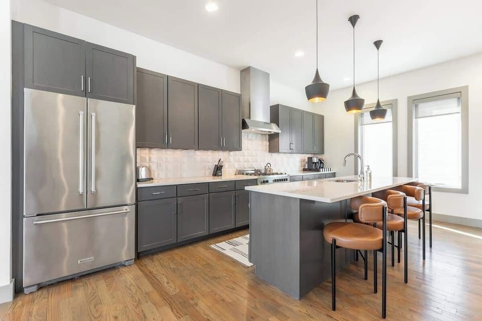 Cook up a storm with stylish appliances and chic bar seating!