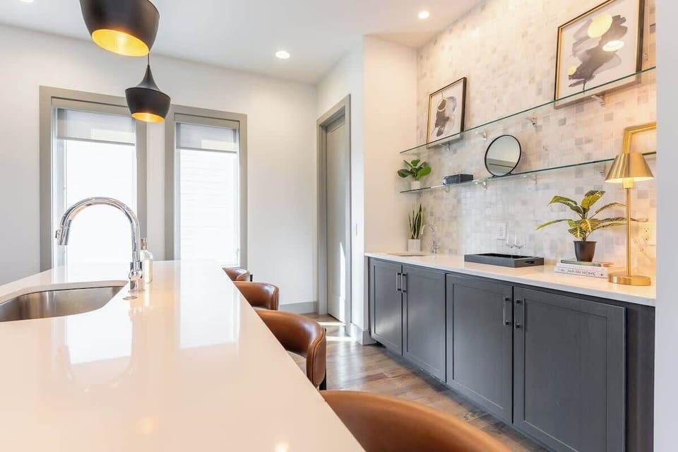  Whip up your favorites in style with sleek finishes and sunlit views!