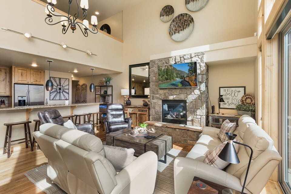 Main Living Space and Kitchen - Gas Fireplace, TV and deck access