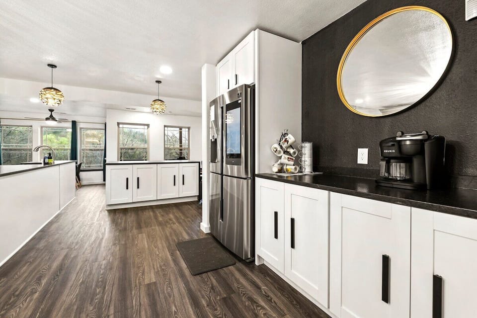 Our kitchen is fully stocked with everything you'll need, including a Samsung Smart Fridge, Keurig coffee maker and Monogram stove.