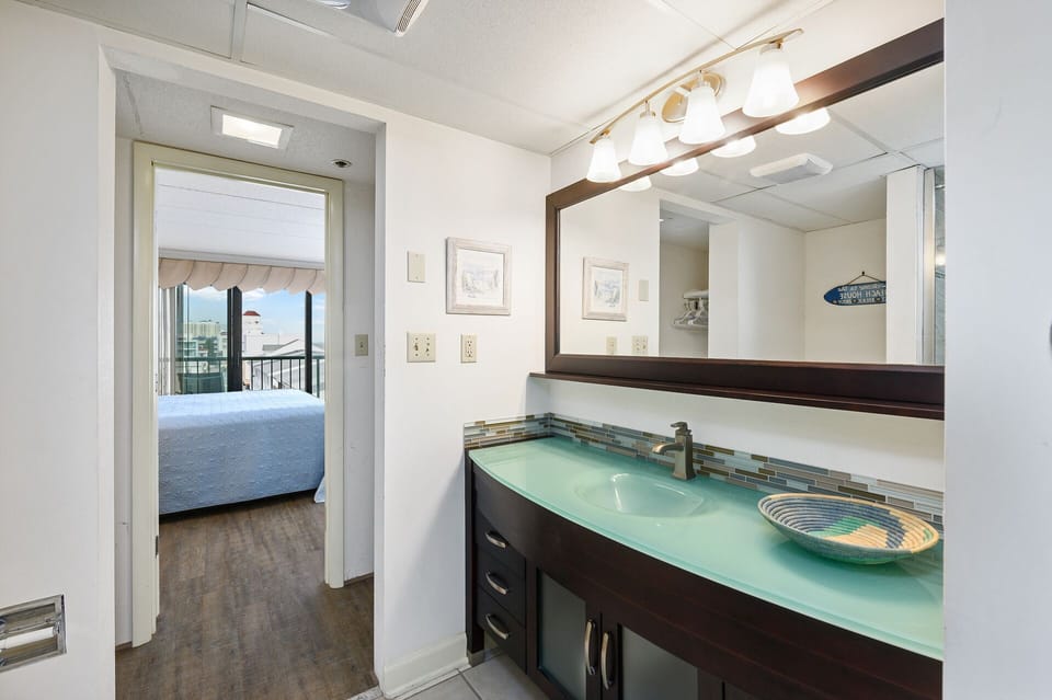 The Primary Bathroom has been beautifully renovated and is home to a walk-in, custom tile shower