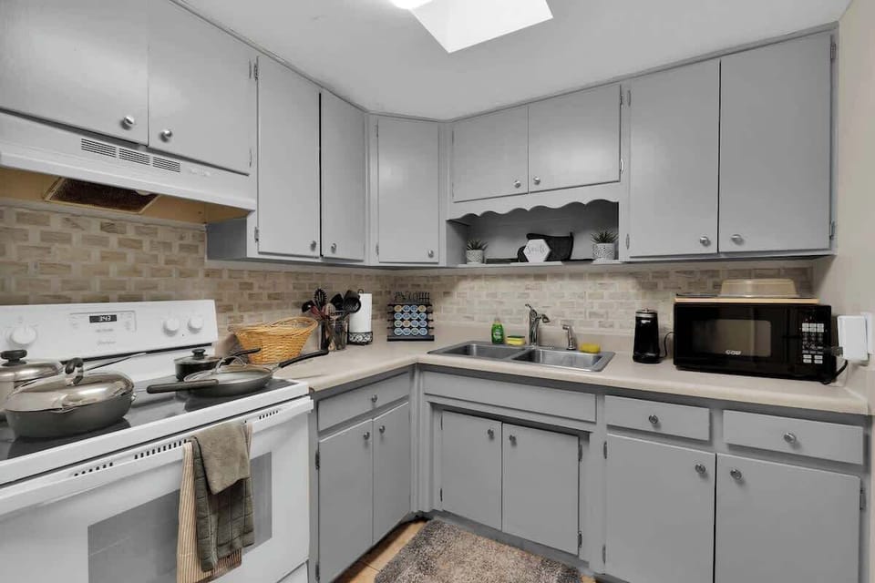 Kitchen Furnishings

Complete with microwave, stove, pots & pans, cups, plates, silverware and coffee together under the Kitchen Skylight.
