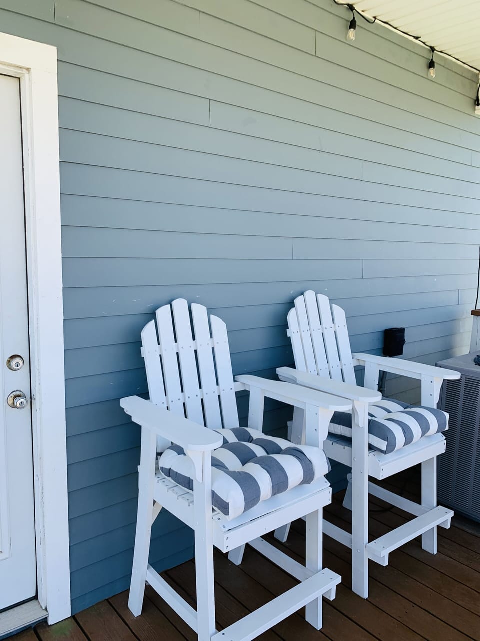 Sitting area outside kitchen door.  Perfect for your first cup of coffee. 
